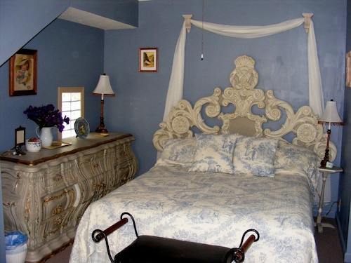 The charming French Chateau overlooks the beautiful falls of the Spring River