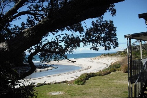 Walk straight onto the sand from your garden.
