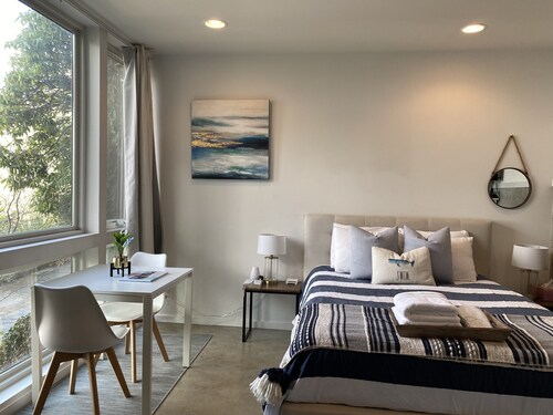 Alki Beach studio with ocean and mountain views. FREE STREET PARKING