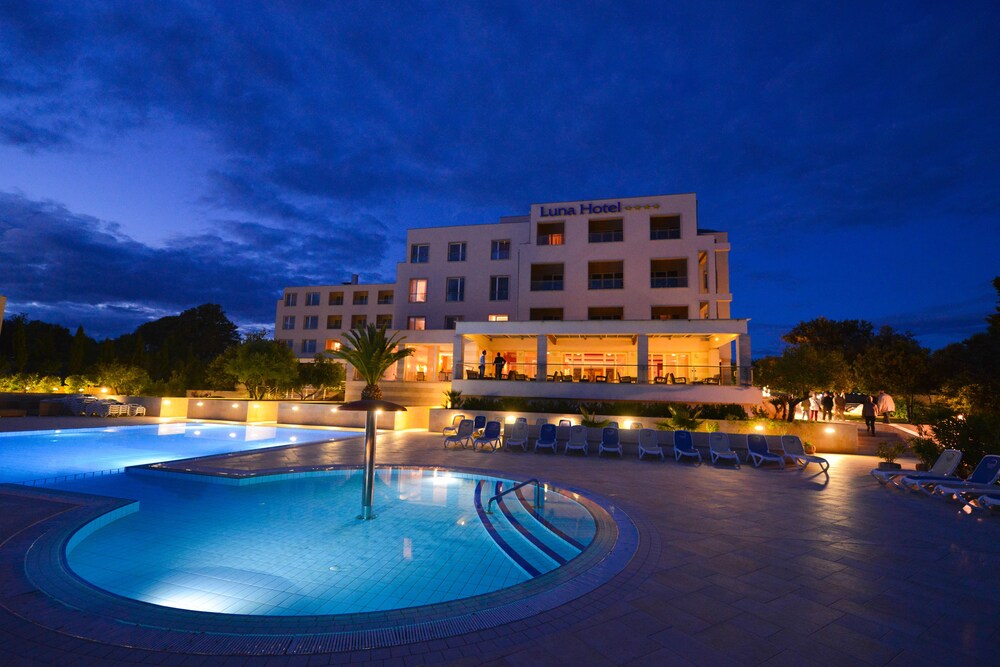 Hotel Front - Evening/Night
