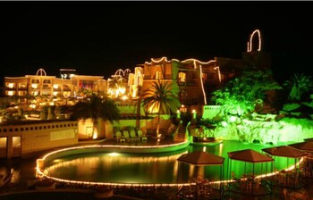 Hotel Front - Evening/Night