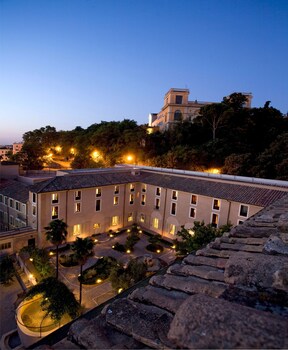 Hotel Front - Evening/Night