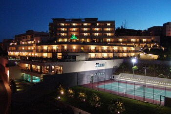 Hotel Front - Evening/Night