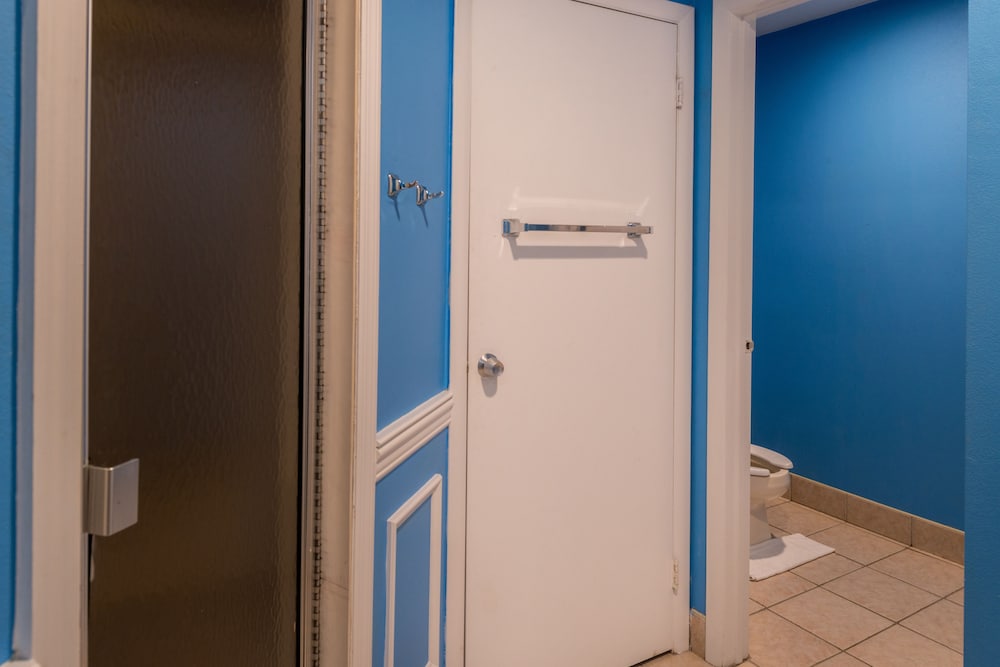 Bathroom shower, Inn of the Dove Romantic Suites with Jetted Tub & Fireplace