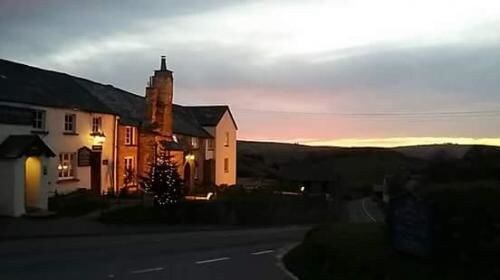 Hotel Front - Evening/Night