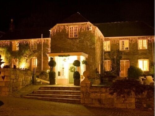 Hotel Front - Evening/Night