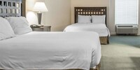 Suite, Non Smoking (2 Queen Beds and 1 Sofa Bed)