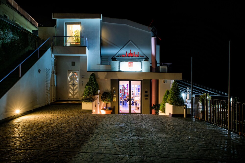 Hotel Front - Evening/Night