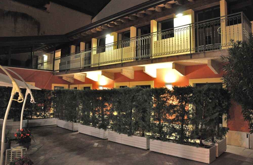 Hotel Front - Evening/Night