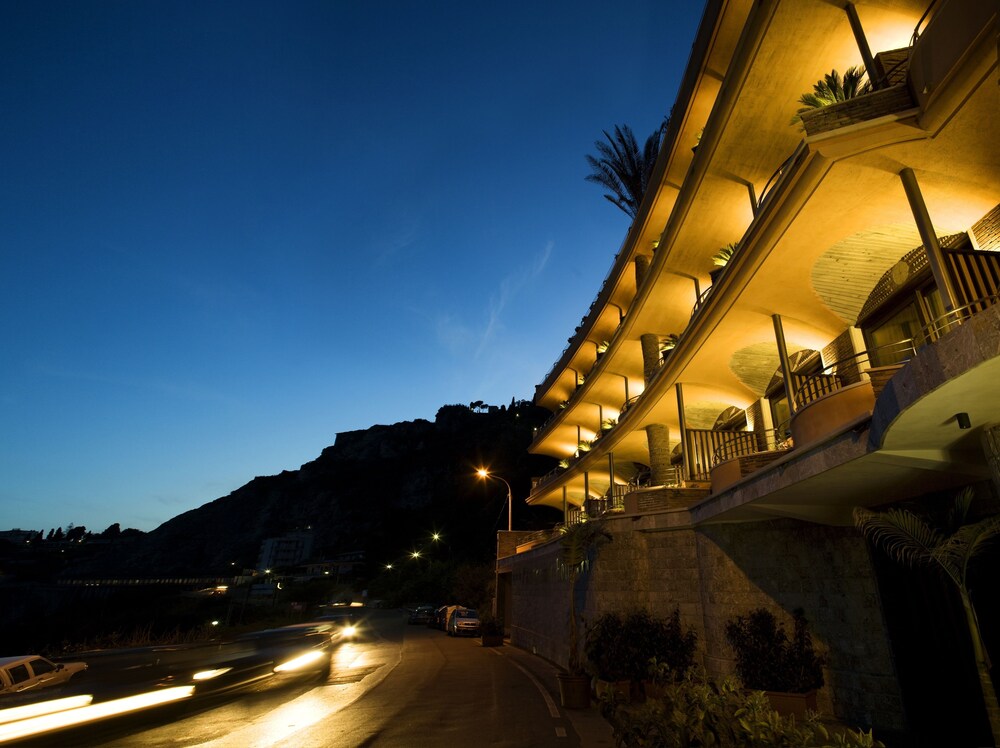 Hotel Front - Evening/Night
