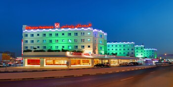 Hotel Front - Evening/Night
