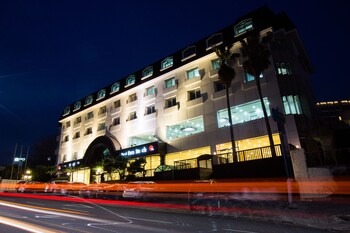 Hotel Front - Evening/Night