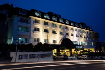Hotel Front - Evening/Night