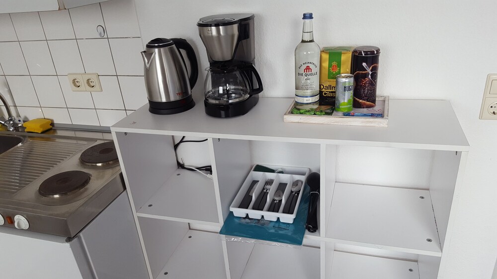 Küche im Zimmer (City-Apartment)