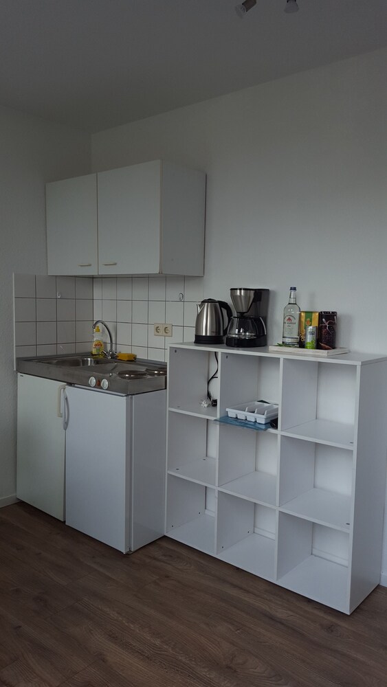 Küche im Zimmer (City-Apartment)