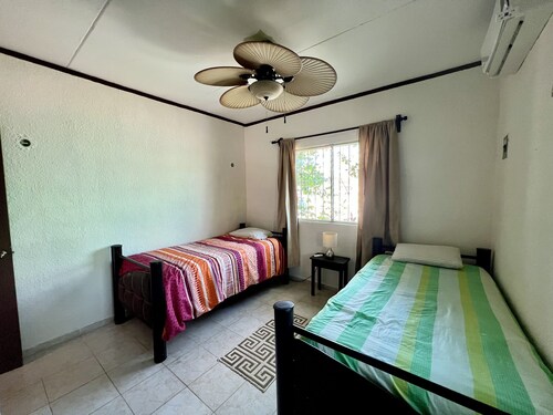 Casa Las Palmas w Swimming Pool & Rooftop Bar! Walk to Xcacel Beach and Cenotes