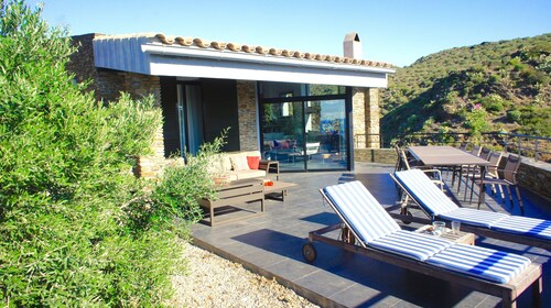 A charming family home with private pool in Cadaques with sea views.