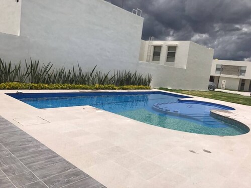 In Industrial Zone, pool, Gym, 24/7 surveillance.