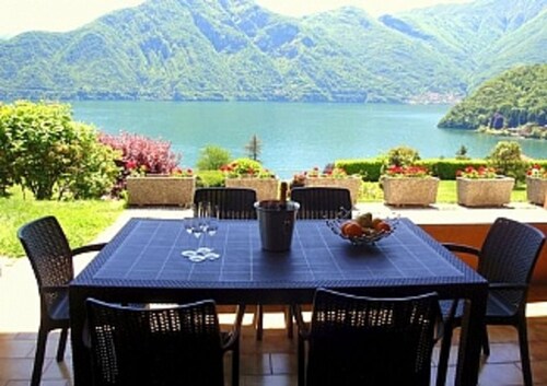 Apartment Bella Vista In Mezzegra lake view pool home.