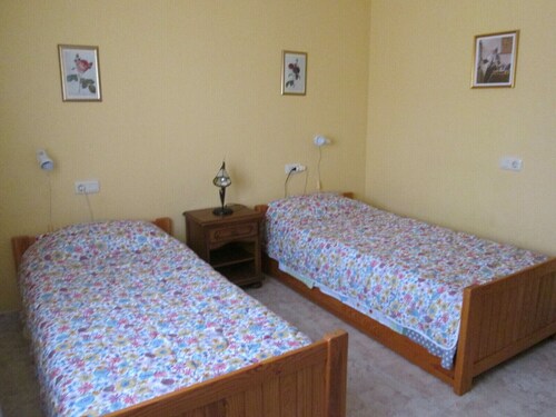 Spatious ground-floor in a two-flats house with terrace, barbecue and garden.