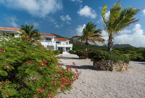 Ocean paradise, just steps from your tranquil townhouse -- swim, dive, relax!