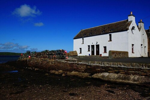 Unique Seaside Cottage in a picturesque village .