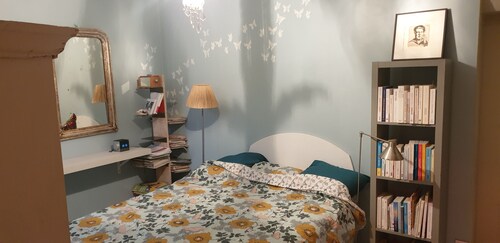Maison de charme dans jardin exotique