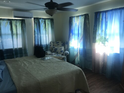 NEW RENTAL!!! Conch Heaven is a four bedroom house on a canal with a dock.