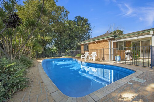 Swimming pool, snooker table, and outdoor BBQ entertaining area