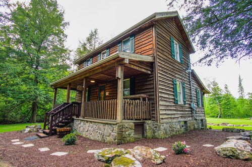 Escape to this comfy cabin in the woods!