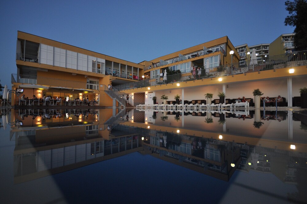 Hotel Front - Evening/Night