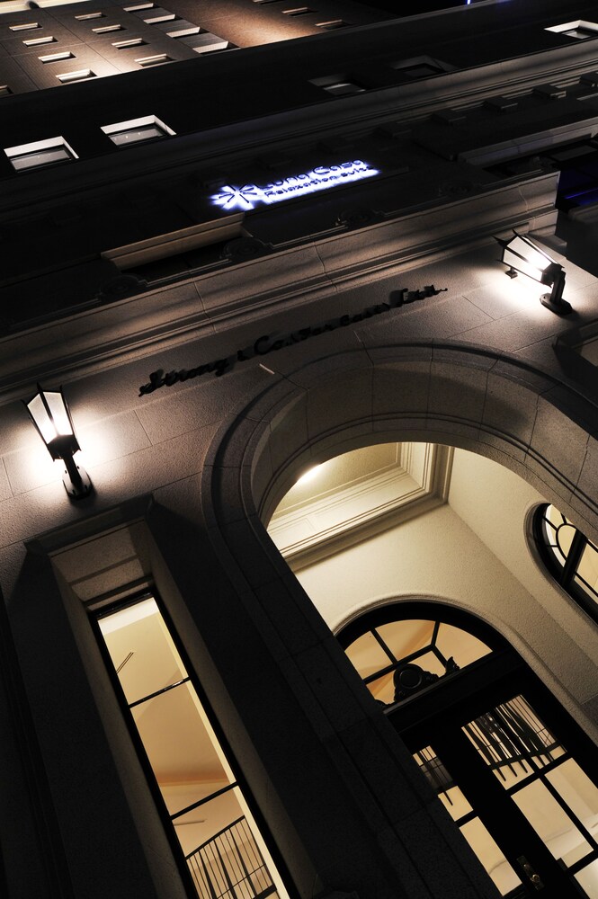 Hotel Front - Evening/Night