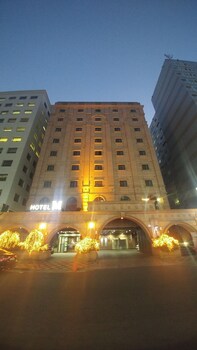 Hotel Front - Evening/Night