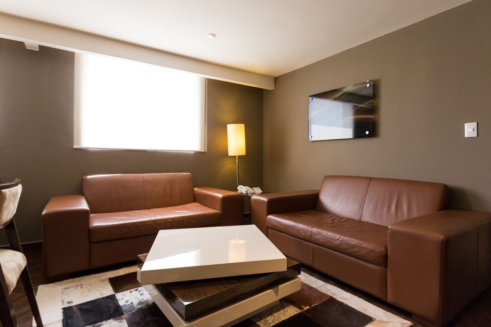 Deluxe Suite, 1 Bedroom - Living Area
