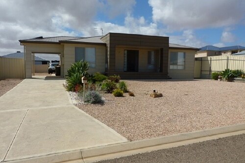 PEBBLES PARADISE is a 4 bed 2 bath modern home a couple minutes from the beach.