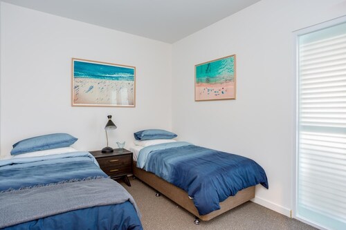 Blue Waters on the Beach: absolute beachfront, views - Beautiful apartment, absolute beach frontage.