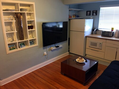 Upscale unit with free parking centrally located
