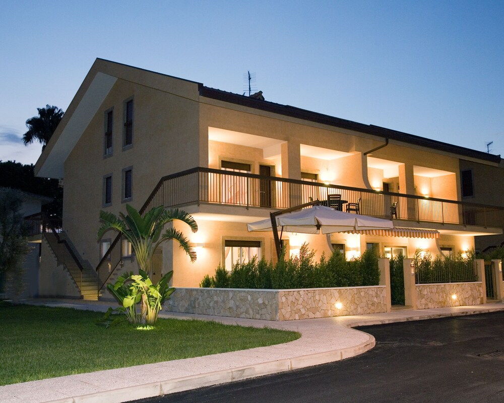 Hotel Front - Evening/Night