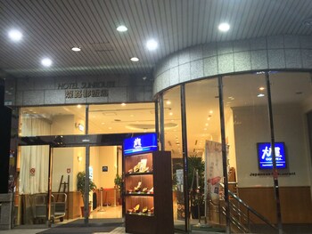 Hotel Front - Evening/Night