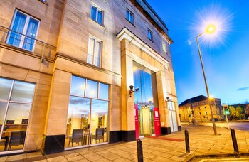 Hotel Front - Evening/Night