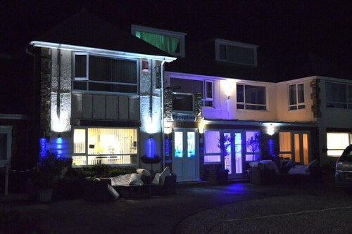 Hotel Front - Evening/Night