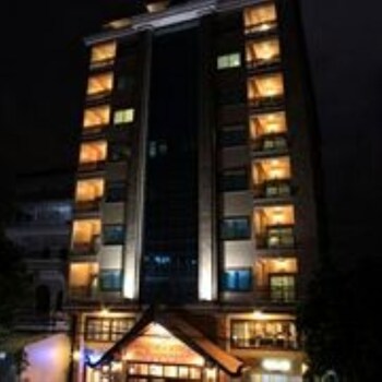 Hotel Front - Evening/Night