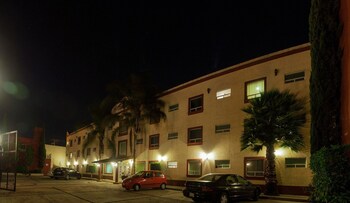 Hotel Front - Evening/Night
