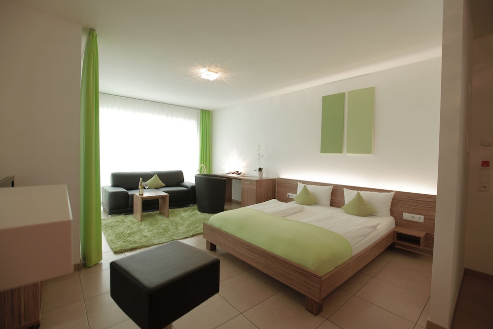 Zimmer (Deluxe-Apartment B)