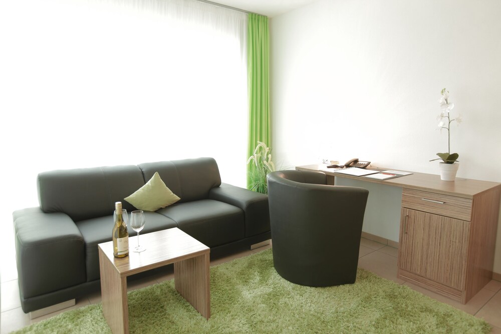 Zimmer (Deluxe-Apartment B)