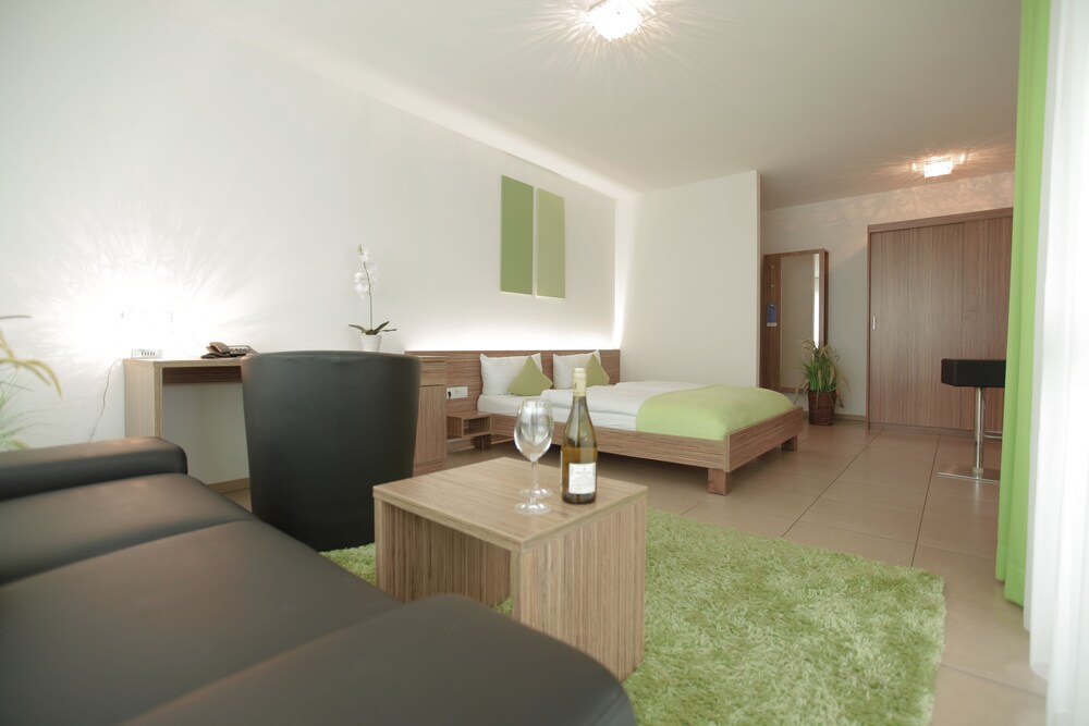 Zimmer (Deluxe-Apartment B)