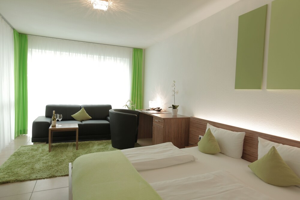 Zimmer (Deluxe-Apartment B)