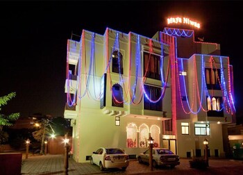 Hotel Front - Evening/Night