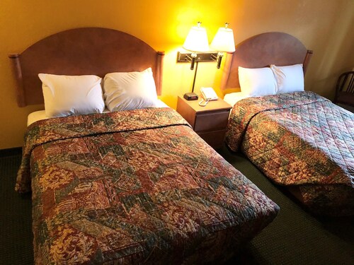 UNIVERSITY INN AND SUITES