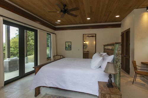 Walk to world famous Maho Bay! Privacy, views, pool, 4 equal king size bedrooms.